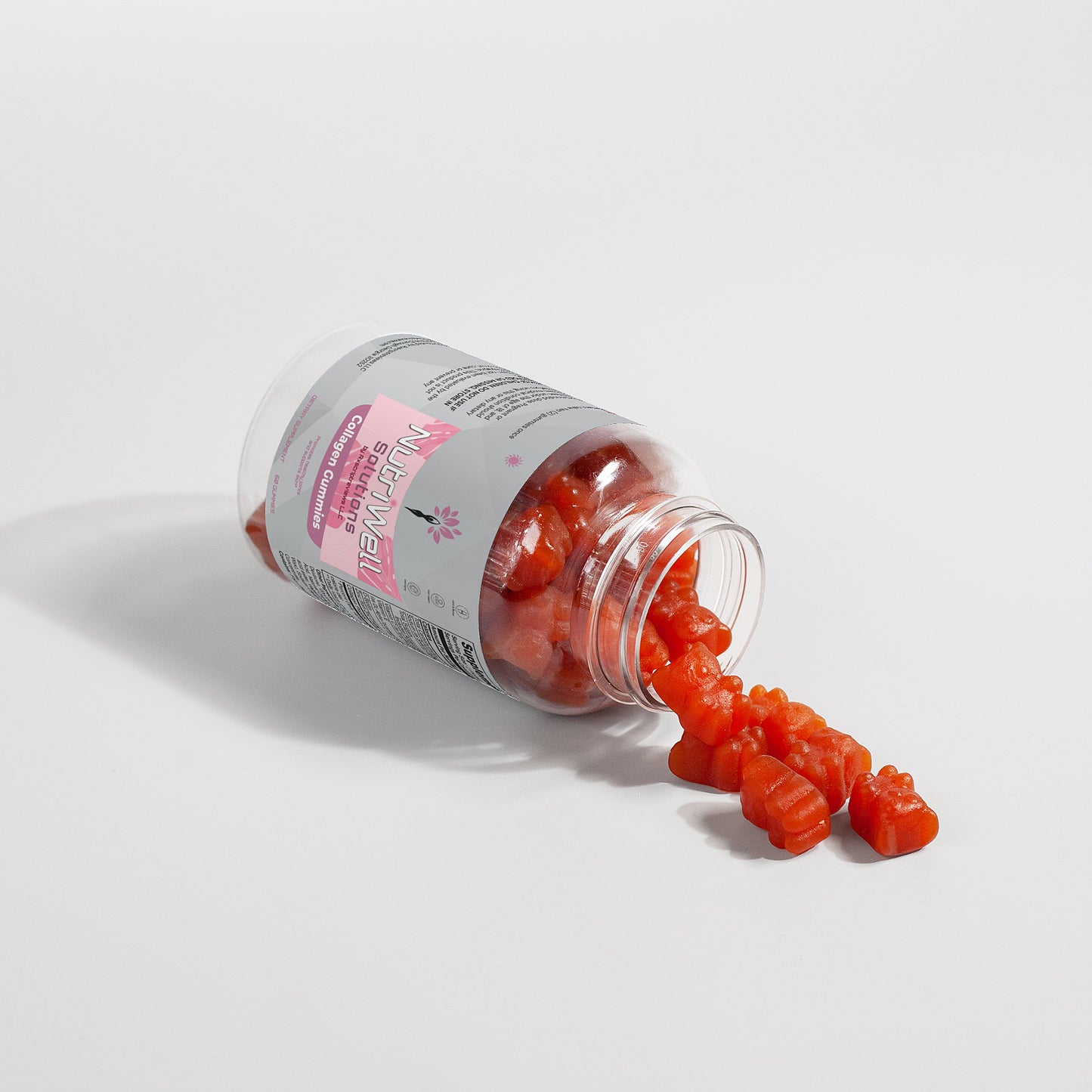 a bottle of NutriWell Solutions Collagen Gummies (Adult) opened with gummies pouring out 